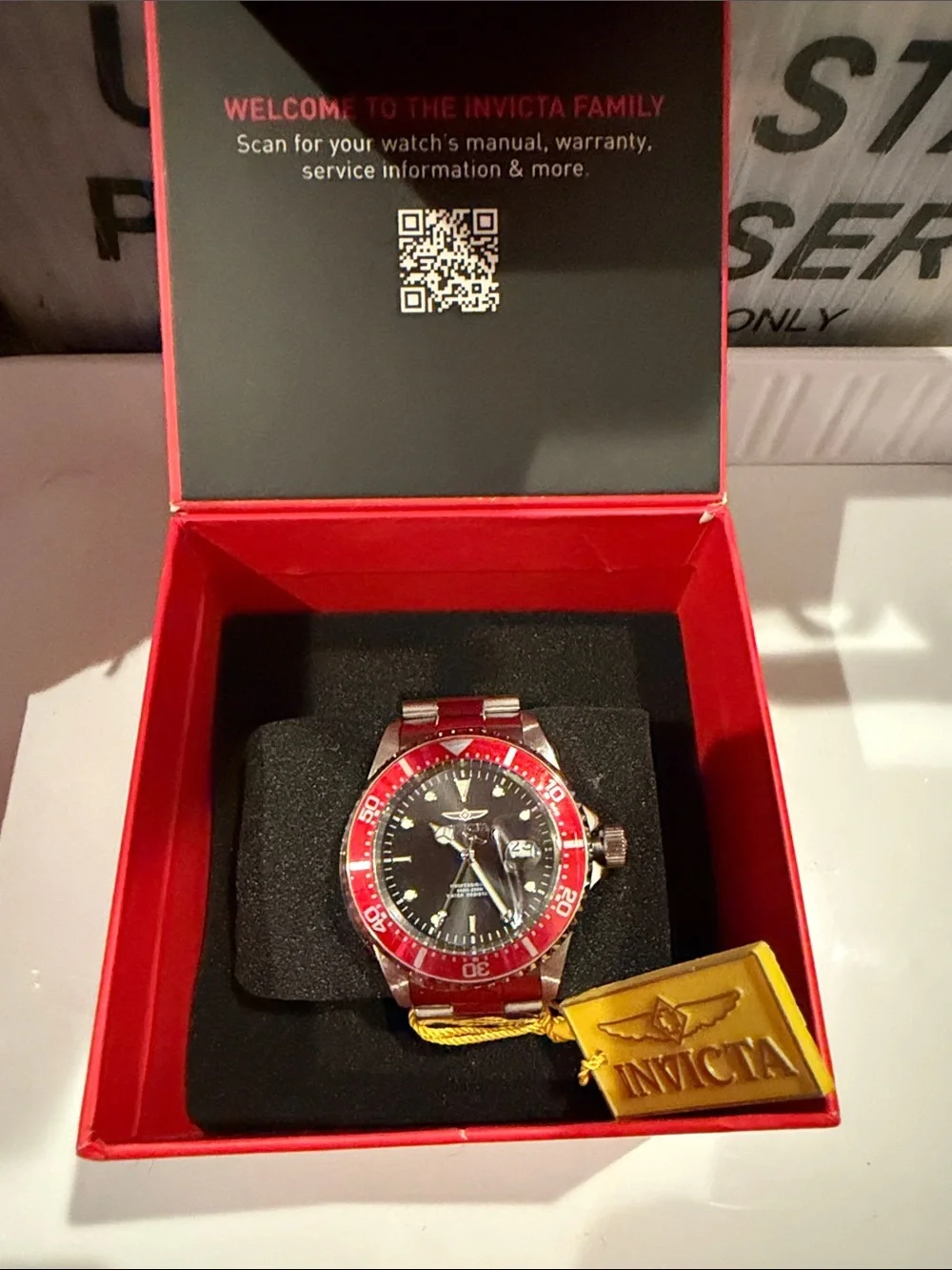 Invicta Men’s Red and Black Stainless Steel Dive-Style Watch